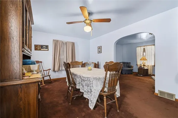 a kitchen with a stove top oven sink and cabinets