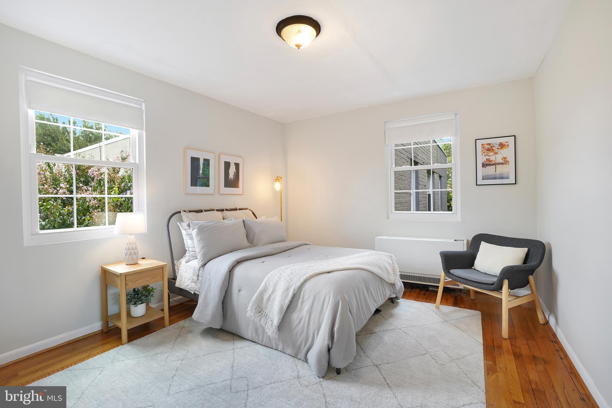 2030 North Vermont Street, Unit 301 Arlington, VA 22207 - Photo 12 of 32 a bedroom with a bed and a window