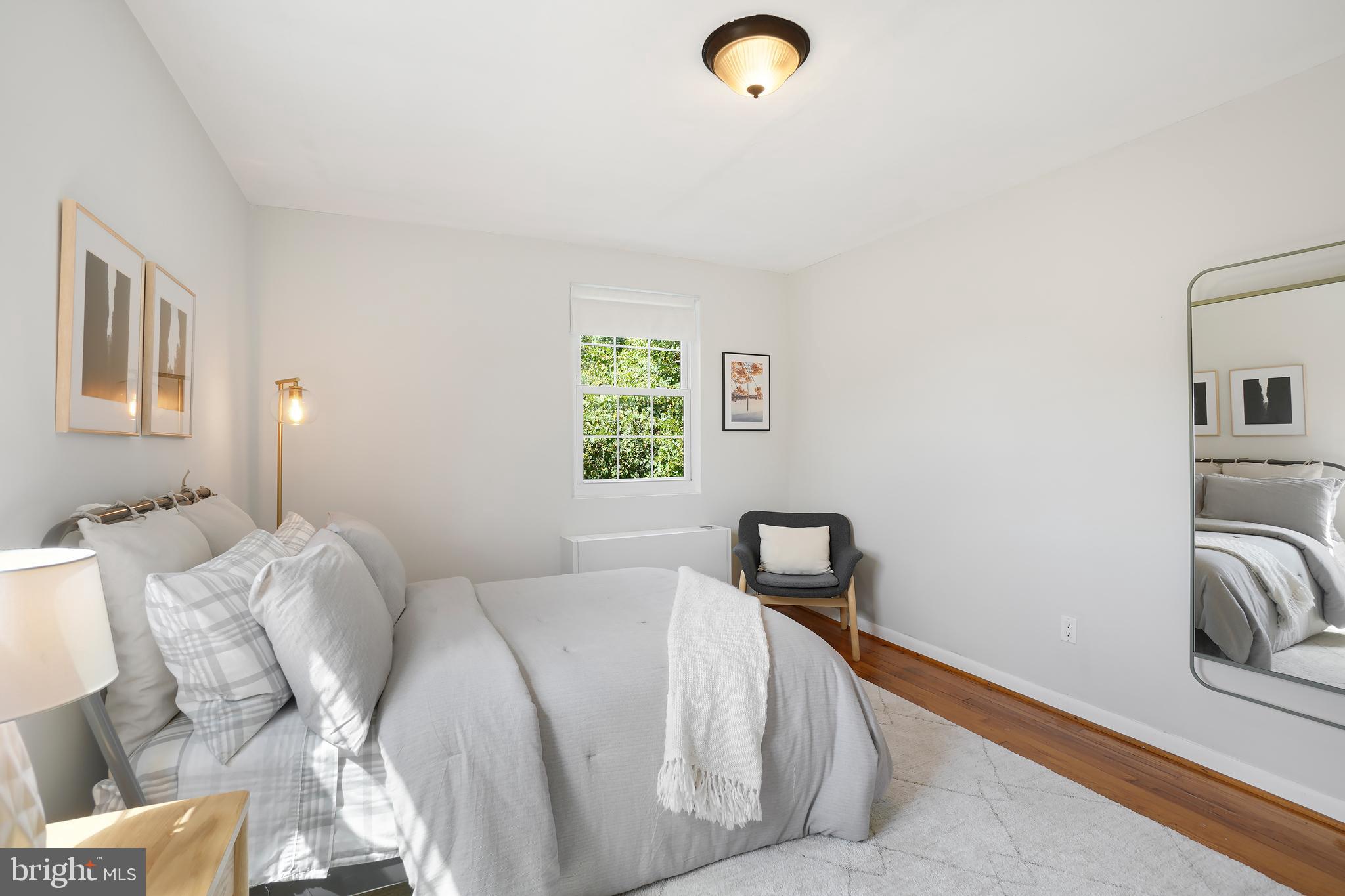 2030 North Vermont Street, Unit 301 Arlington, VA 22207 - Photo 13 of 32 a bedroom with a bed and a window