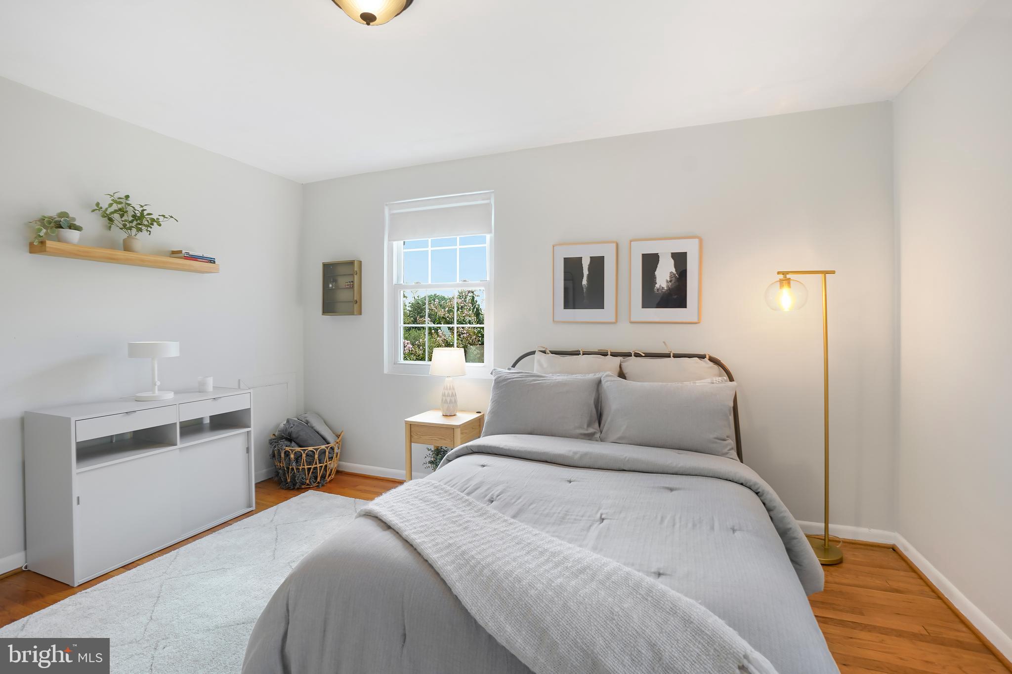 2030 North Vermont Street, Unit 301 Arlington, VA 22207 - Photo 14 of 32 a bedroom with a bed and a window