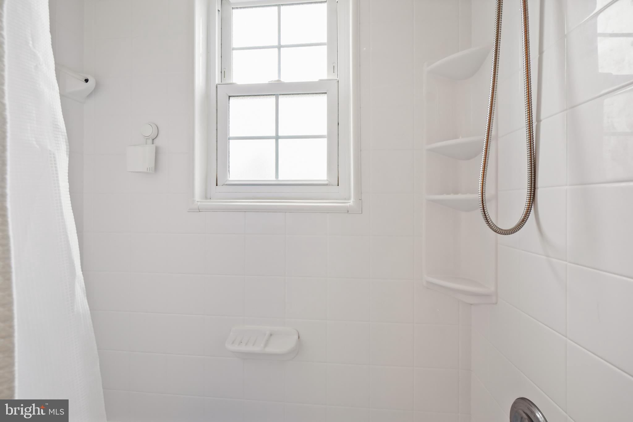 2030 North Vermont Street, Unit 301 Arlington, VA 22207 - Photo 18 of 32 a bathroom with a shower