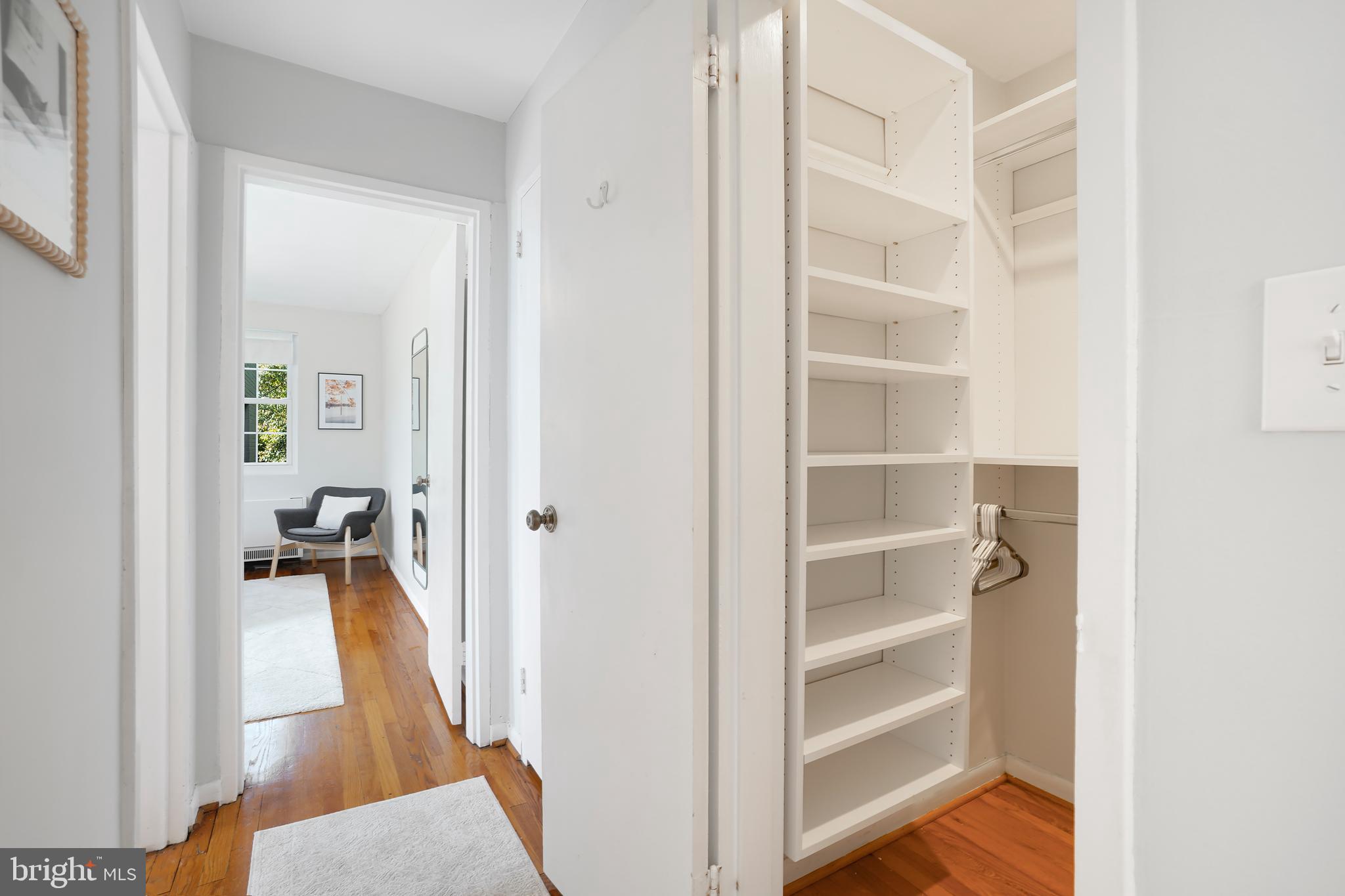 2030 North Vermont Street, Unit 301 Arlington, VA 22207 - Photo 20 of 32 a walk in closet with wooden floor