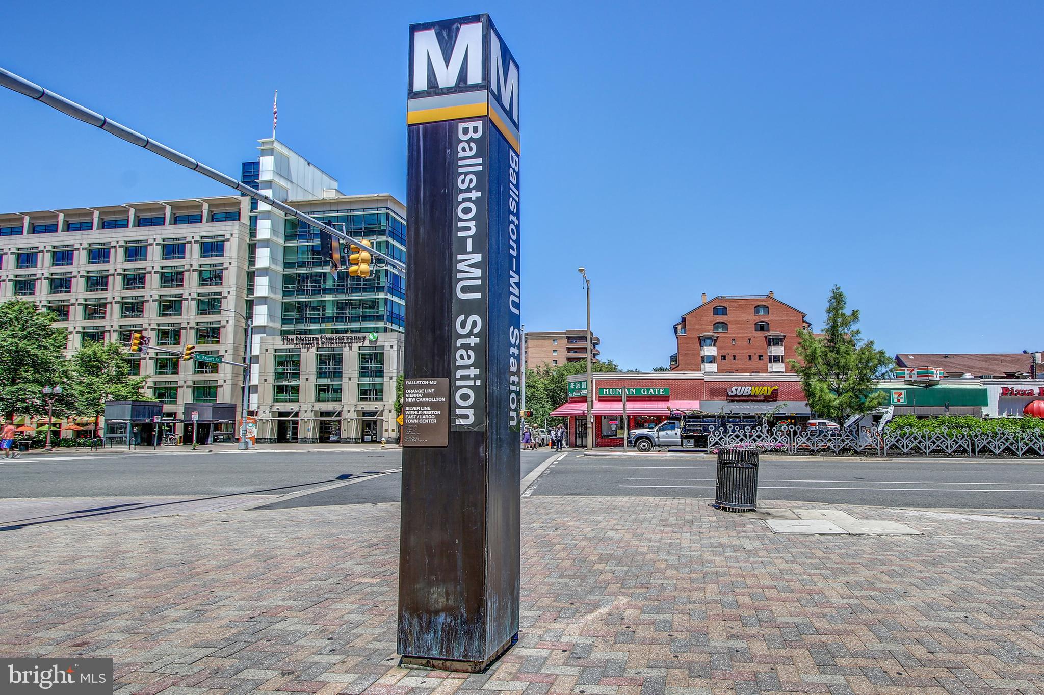 2030 North Vermont Street, Unit 301 Arlington, VA 22207 - Photo 29 of 32 a street sign on a sidewalk next to a road