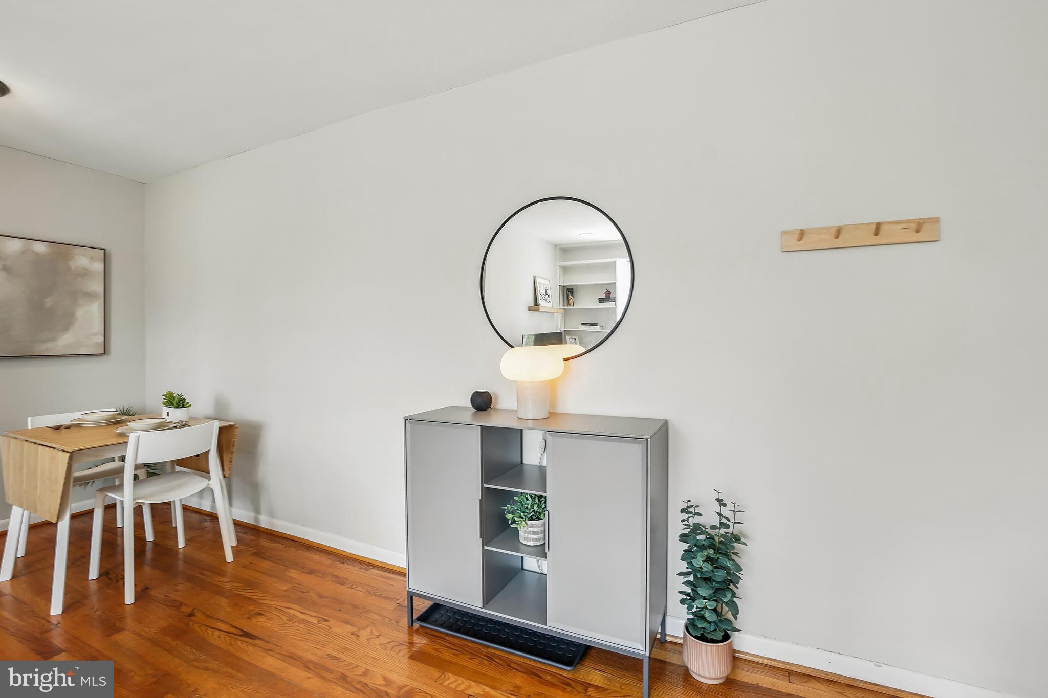 2030 North Vermont Street, Unit 301 Arlington, VA 22207 - Photo 6 of 32 a view of a workspace with furniture and wooden floor