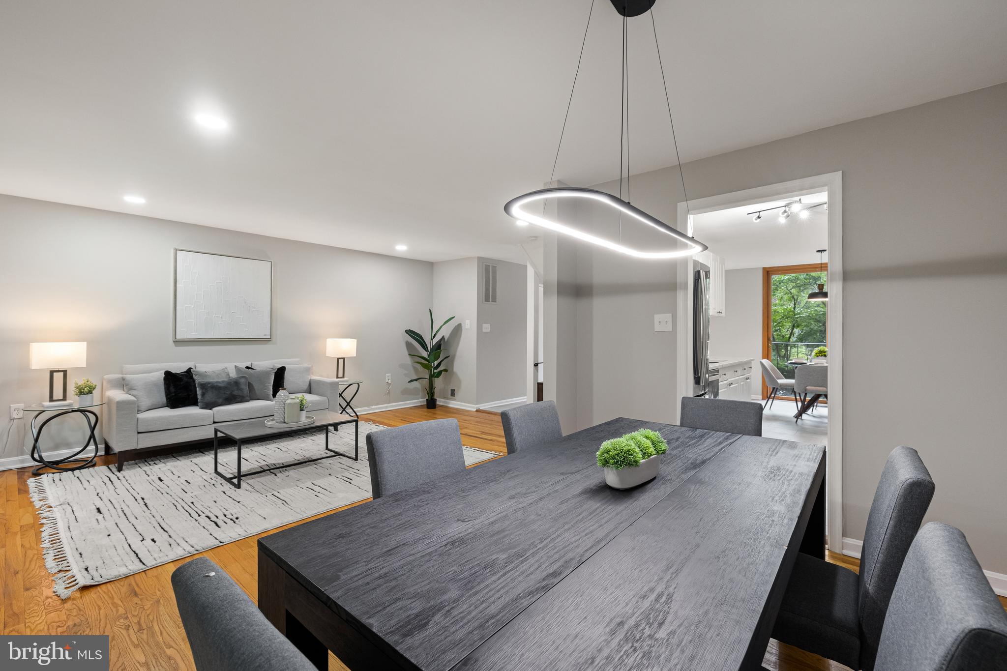 8006 Inverness Ridge Road Potomac, MD 20854 - Photo 14 of 43 Dining area leads to your spacious family room.