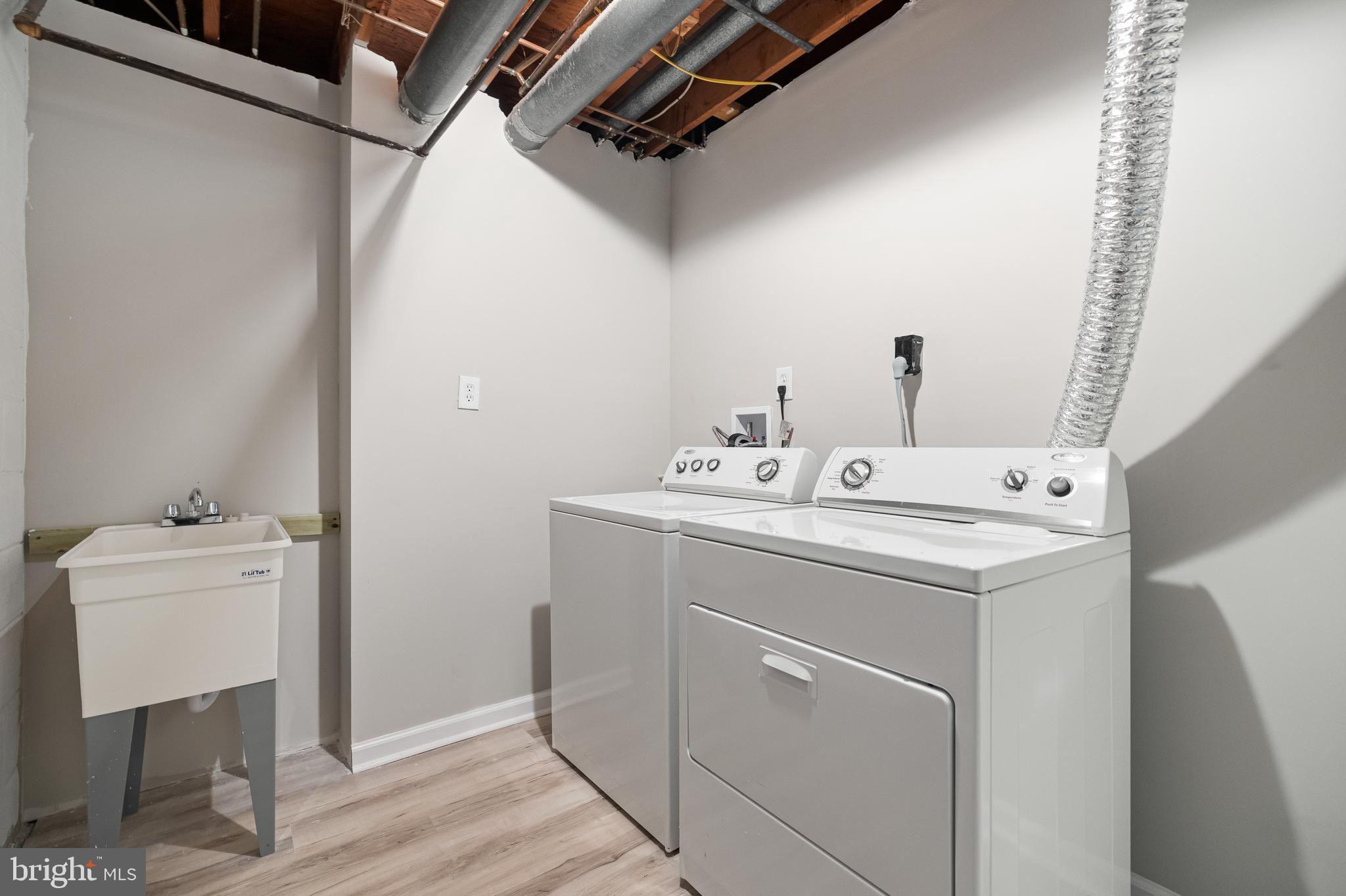 8006 Inverness Ridge Road Potomac, MD 20854 - Photo 32 of 43 Laundry room in basement, plus another fridge.