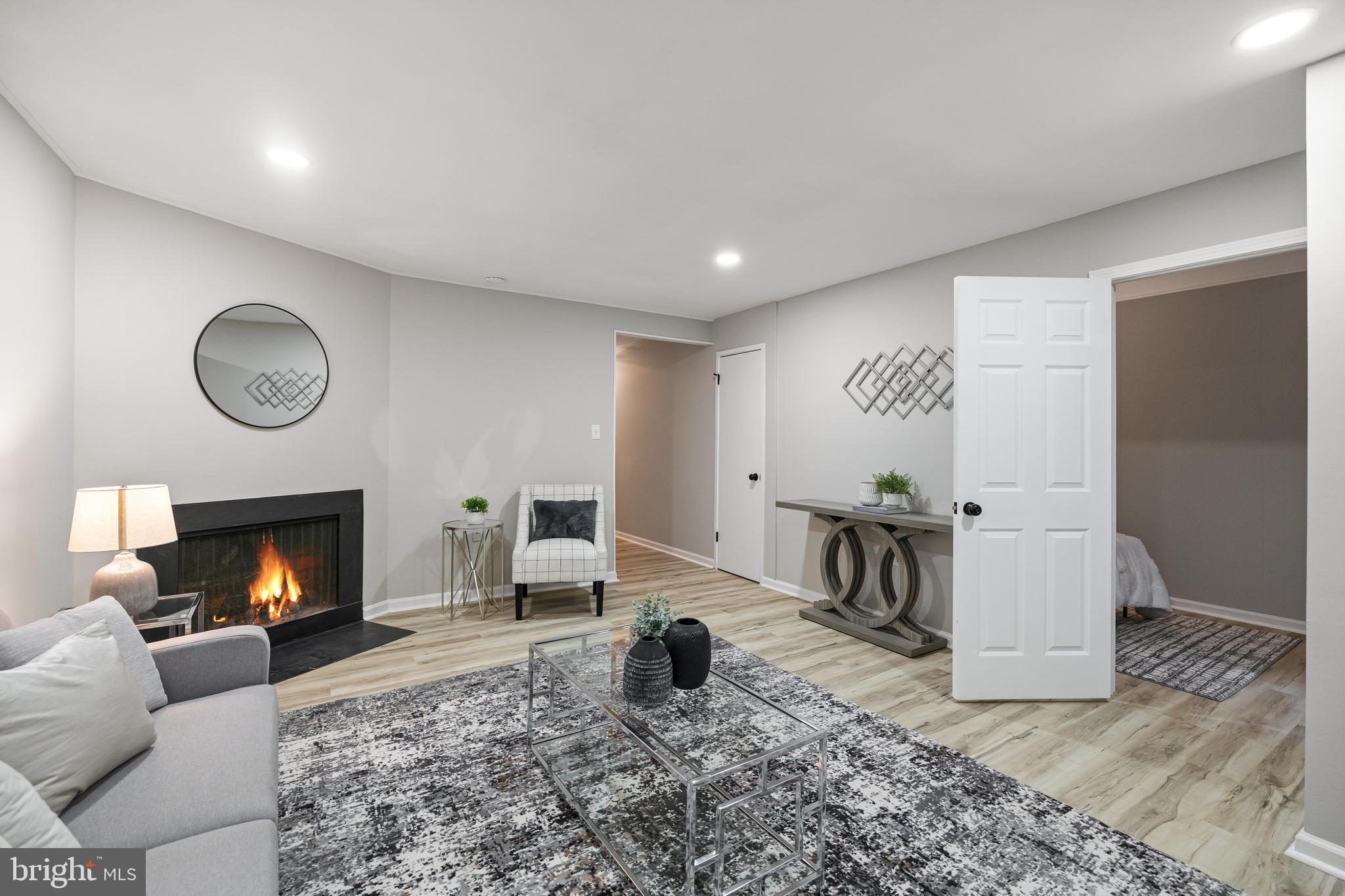 8006 Inverness Ridge Road Potomac, MD 20854 - Photo 34 of 43 Cozy fireplace and recessed lights!