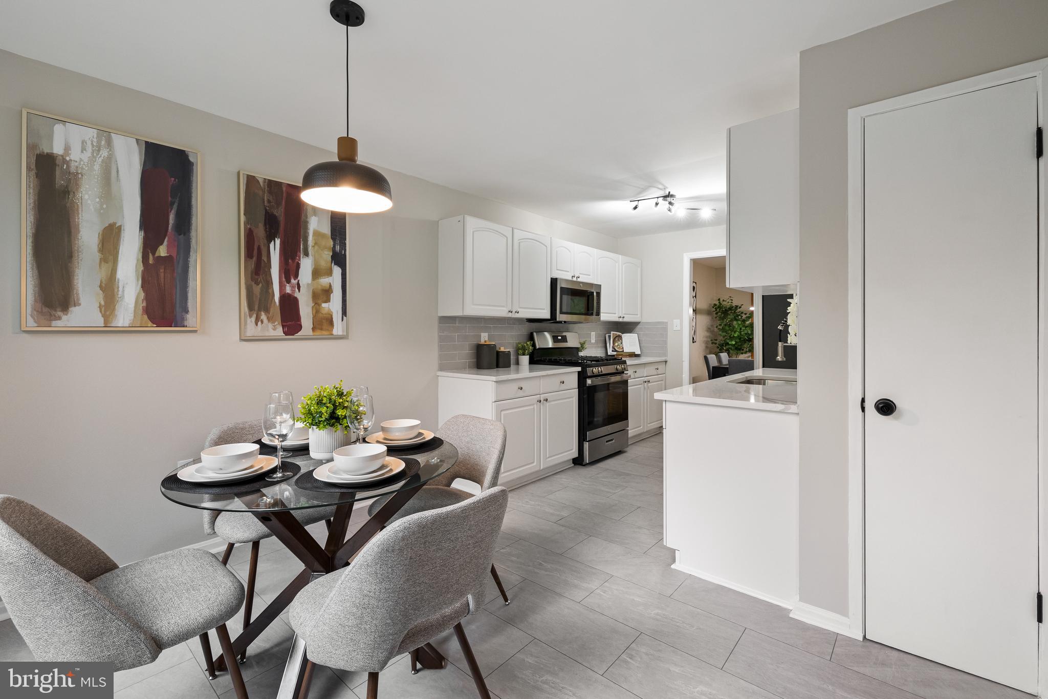 8006 Inverness Ridge Road Potomac, MD 20854 - Photo 6 of 43 Breakfast nook leading into updated kitchen.
