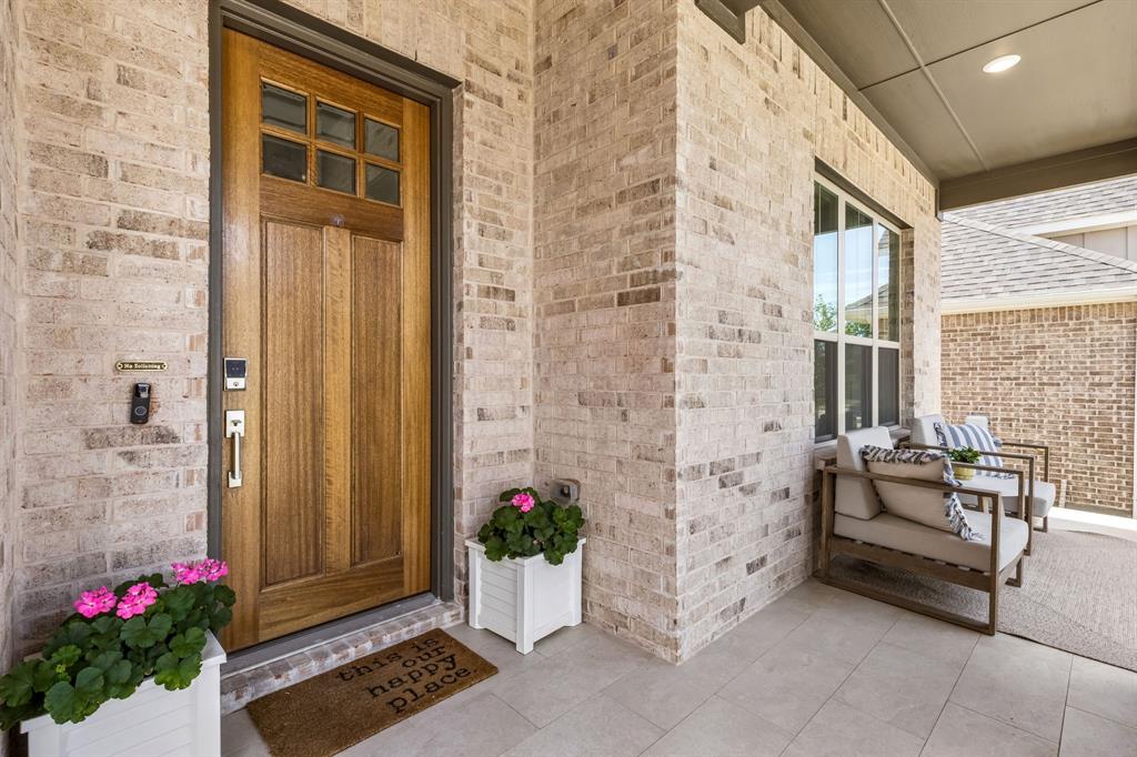 3004 Windy Rdg Road McKinney, TX 75071 - Photo 30 of 40 a view of front door with outdoor seating