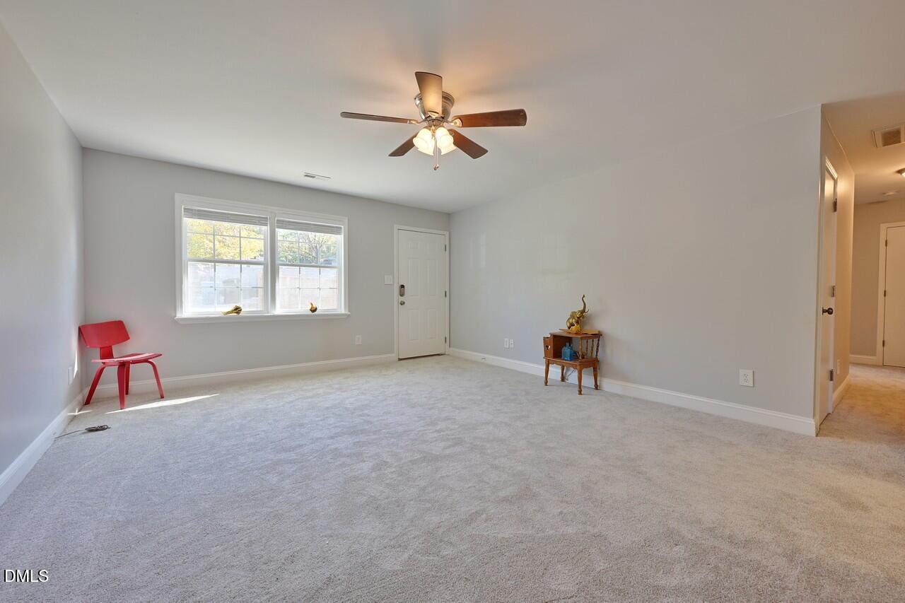 621 Martin Street Durham, NC 27704 - Photo 11 of 39 a view of livingroom and workspace with windows