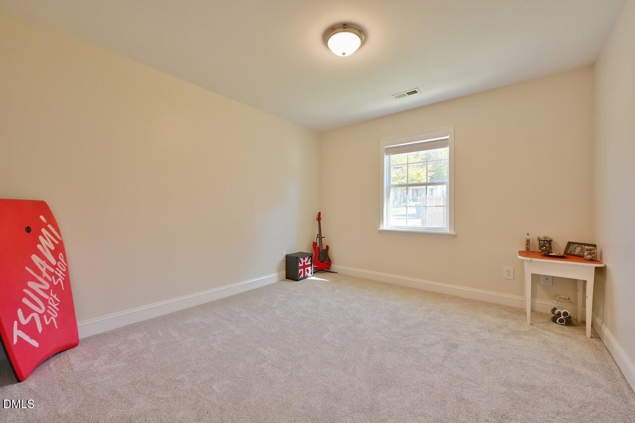 621 Martin Street Durham, NC 27704 - Photo 22 of 39 an empty room with windows