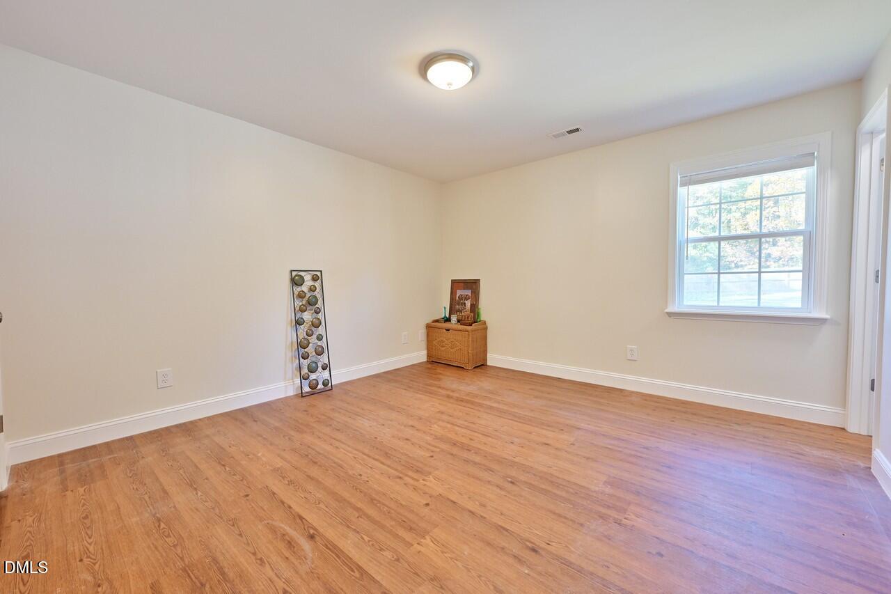 621 Martin Street Durham, NC 27704 - Photo 27 of 39 a view of empty room with wooden floor