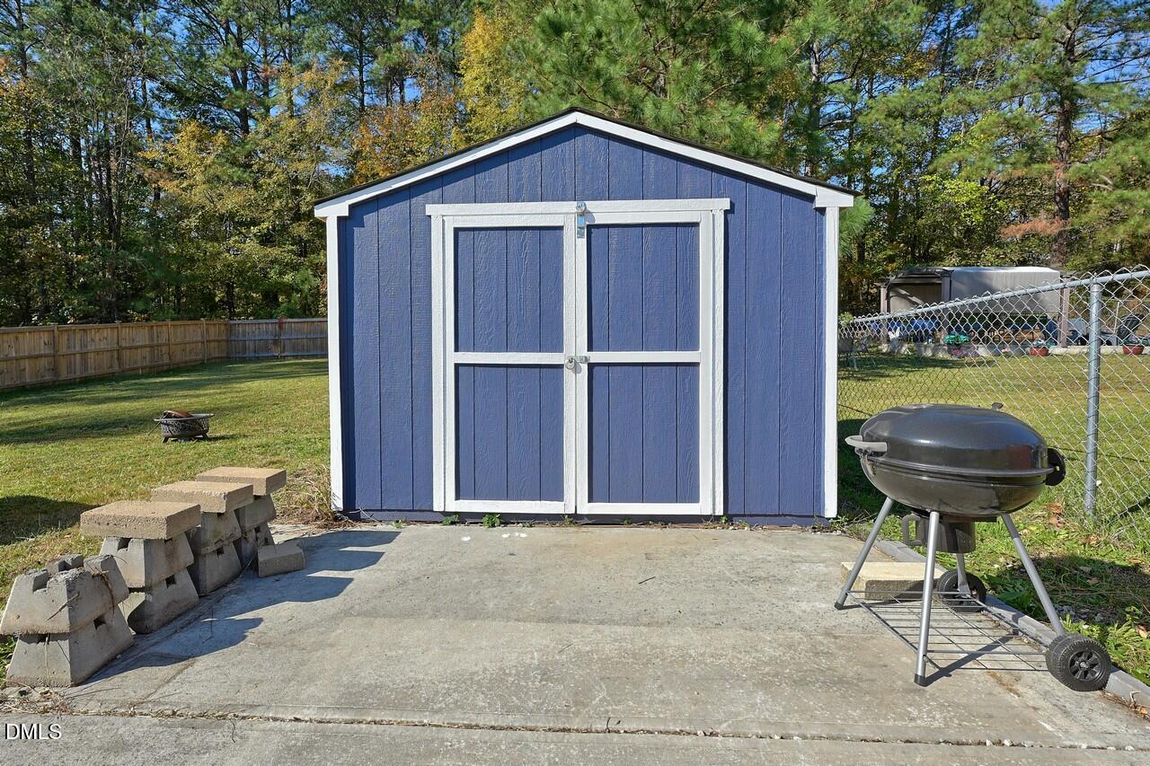 621 Martin Street Durham, NC 27704 - Photo 34 of 39 a front view of house with yard