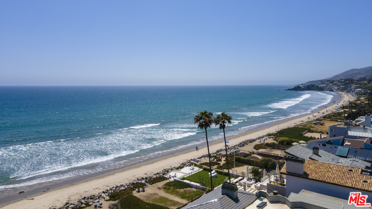31030 Broad Beach Road Malibu, CA 90265 - Photo 40 of 45 a view of a terrace with a yard