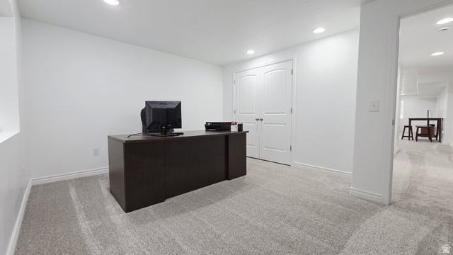 1437 925 South Vernal, UT 84078 - Photo 26 of 47 Spacious room featuring light-colored carpet flooring and white walls