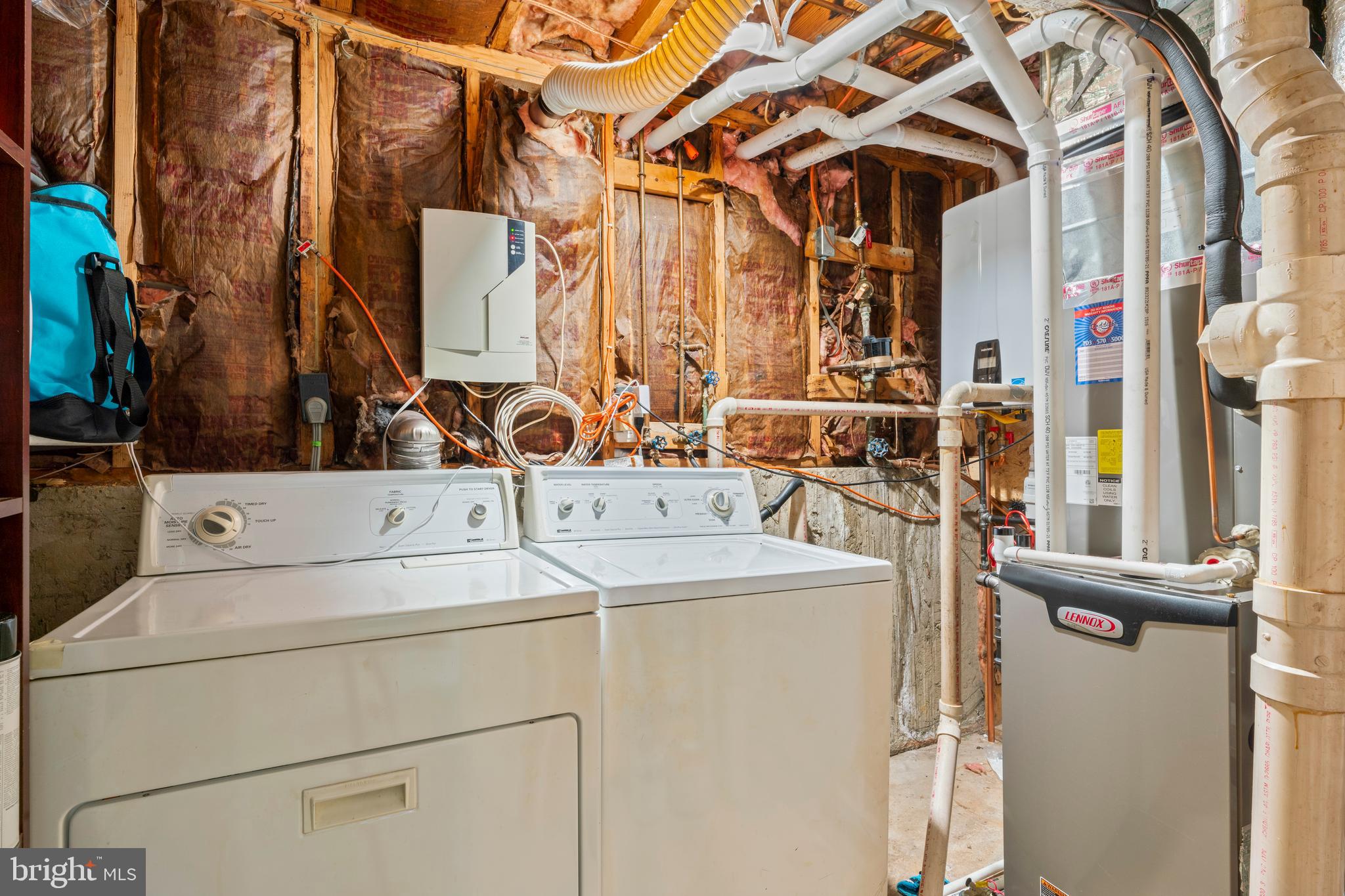 7627 Fallswood Way Lorton, VA 22079 - Photo 30 of 38 a utility room with dryer and washer