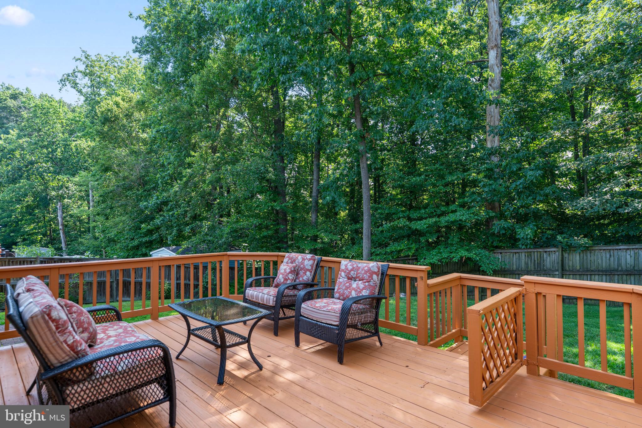 7627 Fallswood Way Lorton, VA 22079 - Photo 34 of 38 a view of sitting area with furniture and wooden deck