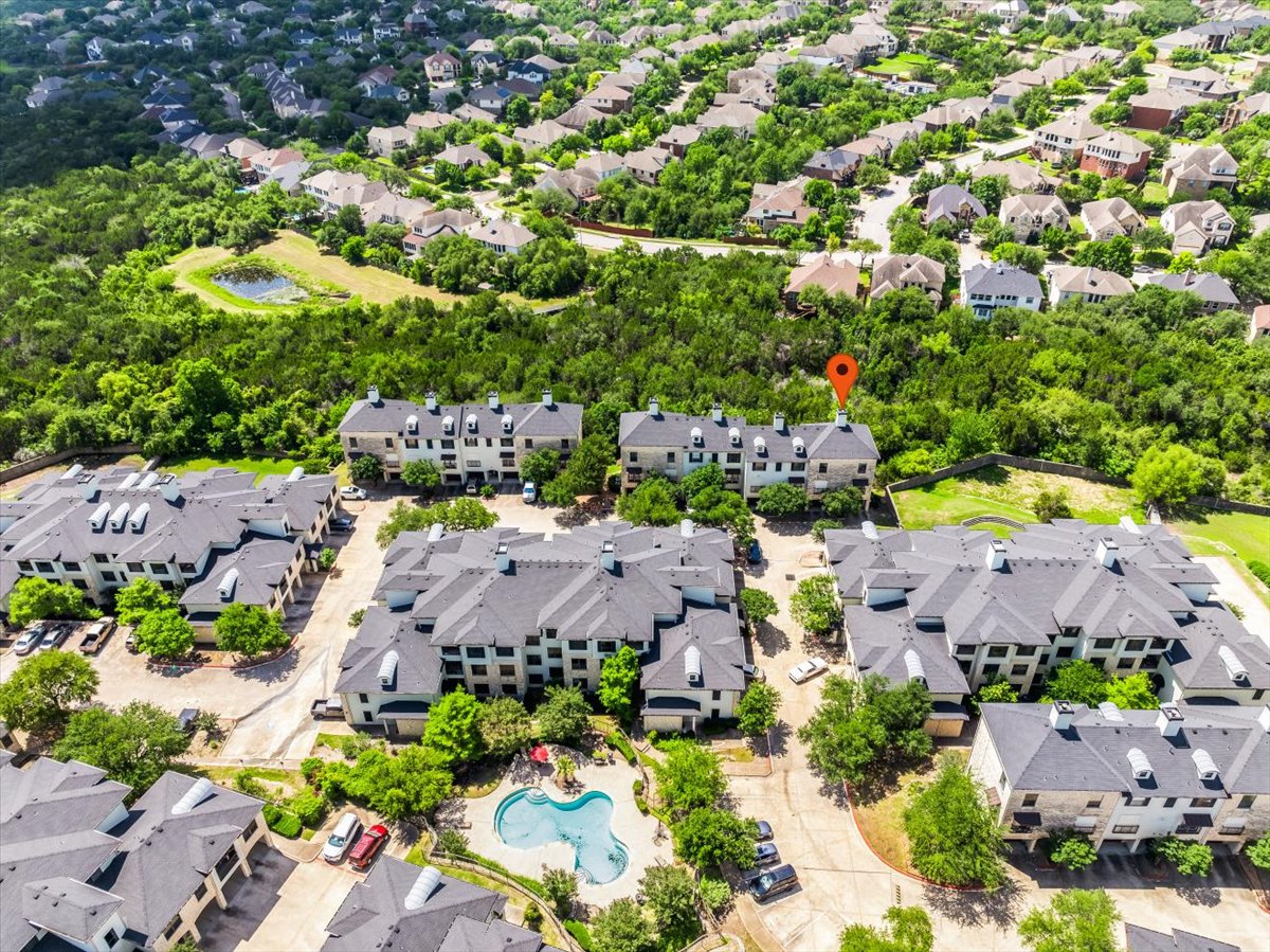 7701 Rialto Boulevard, Unit 91 Austin, TX 78735 - Photo 2 of 39 an aerial view of house with yard swimming pool and outdoor seating