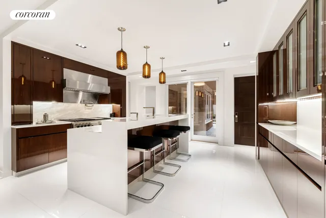 a spacious bathroom with a shower sink and a mirror