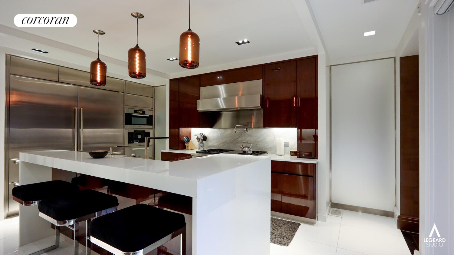 46 East 66th Street Manhattan, NY 10065 - Photo 11 of 64 a kitchen with a sink cabinets and window