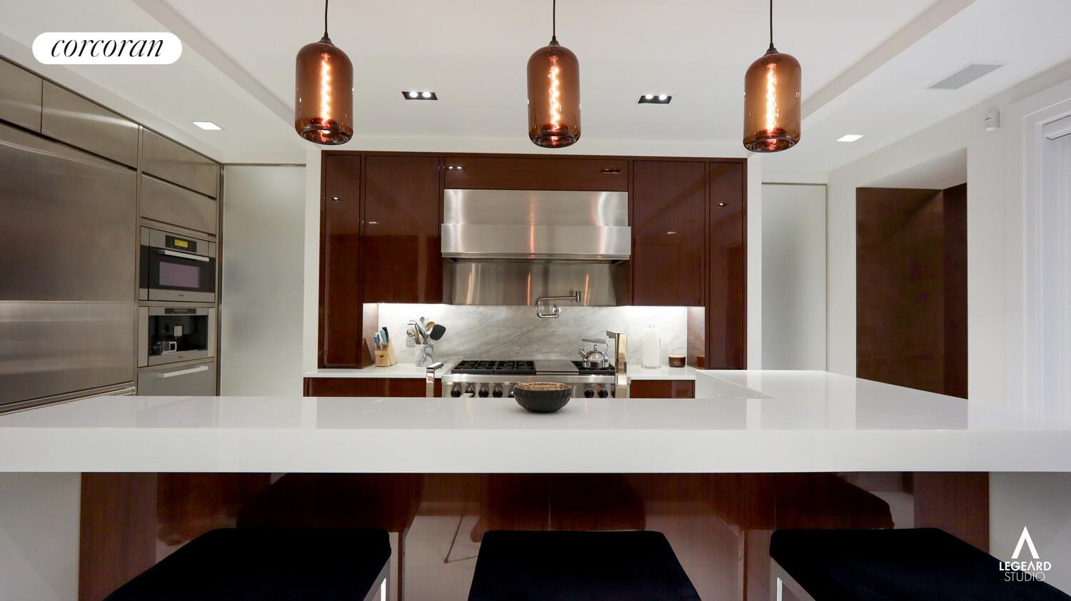 46 East 66th Street Manhattan, NY 10065 - Photo 12 of 64 a bathroom with a sink a mirror and vanity