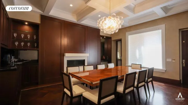 a living room with furniture and a stairs