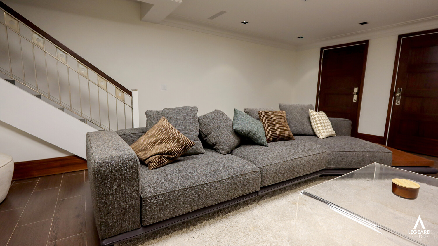 46 East 66th Street Manhattan, NY 10065 - Photo 59 of 64 a living room with furniture and wooden floor