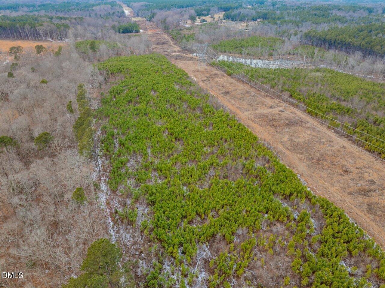558 Jones Ferry Road Pittsboro, NC 27312 - Photo 7 of 19 a view of a lake with a yard