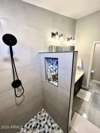 a bathroom with a sink and a shower