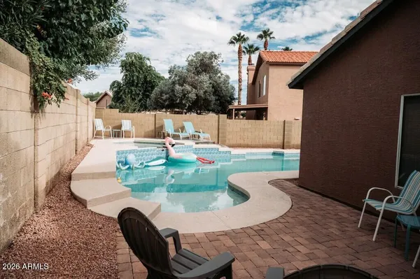 a backyard of a house with seating space