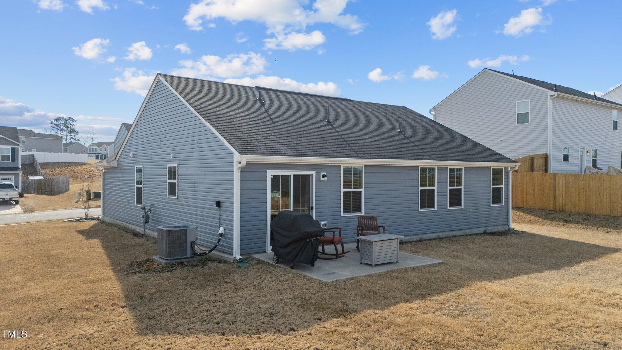 45 Florentine Court Angier, NC 27501 - Photo 12 of 27 a house view with a backyard space
