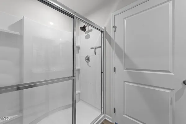 a bathroom with a sink and a shower