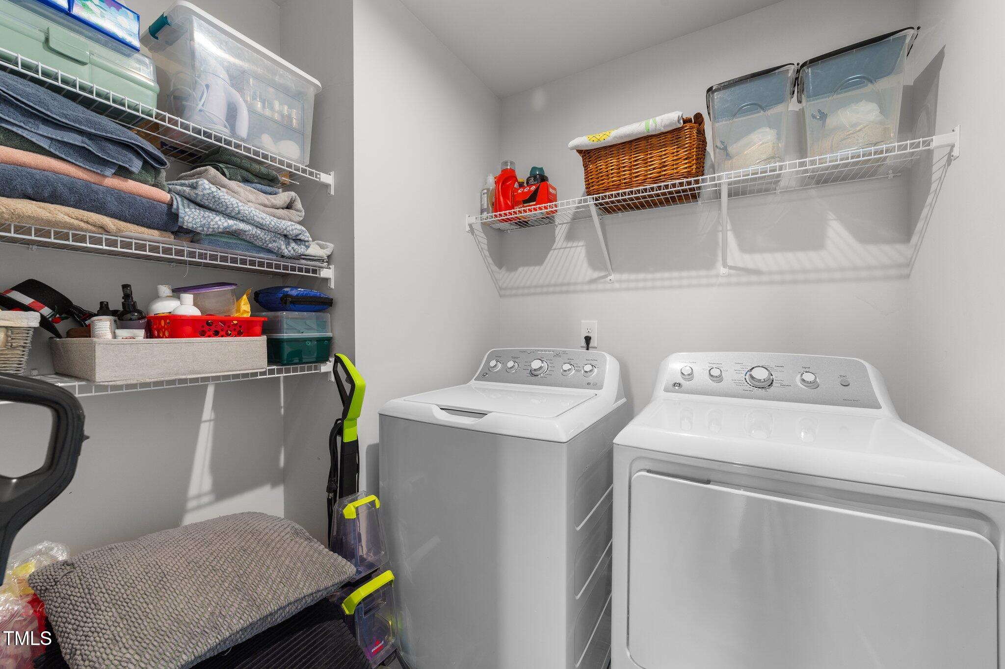 45 Florentine Court Angier, NC 27501 - Photo 9 of 27 a utility room with dryer and washer