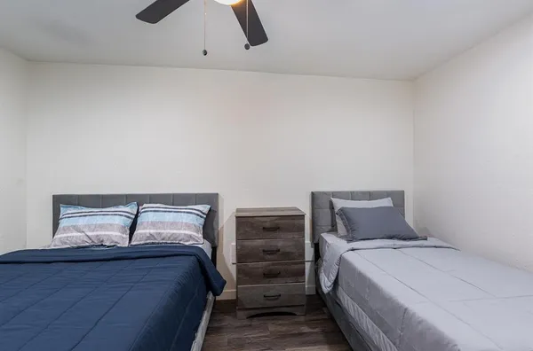 a bedroom with a bed and a closet