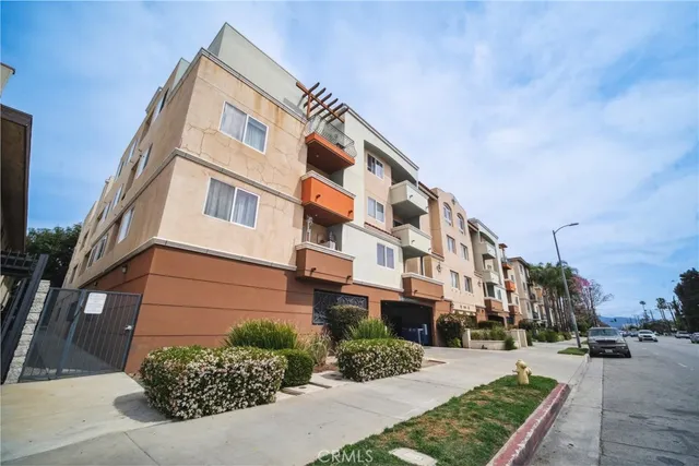 a view of a street with buildings