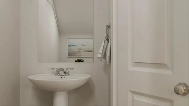 a bathroom with a sink a mirror and shower