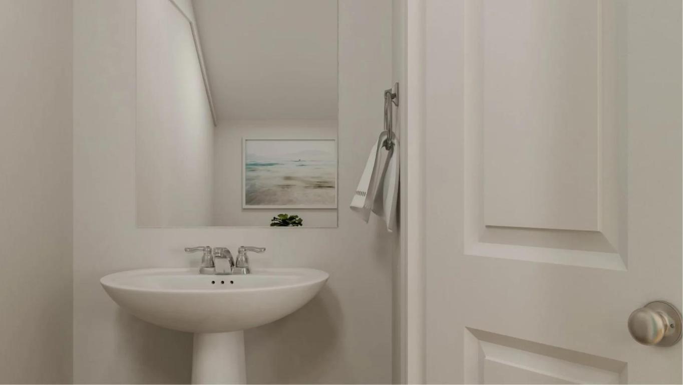 173 Bugbee Kyle, TX 78640 - Photo 11 of 17 a bathroom with a sink a mirror and shower