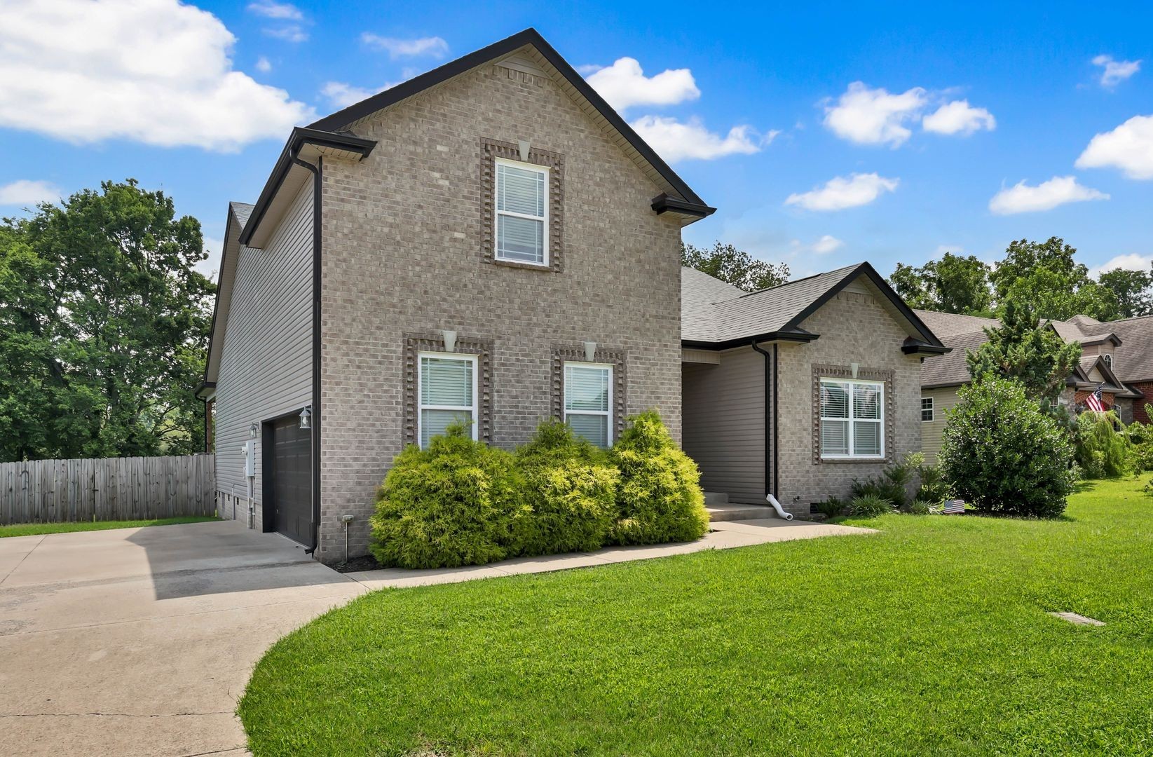 987 Promenade Drive Adams, TN 37010 - Photo 2 of 34 a front view of house with yard and green space