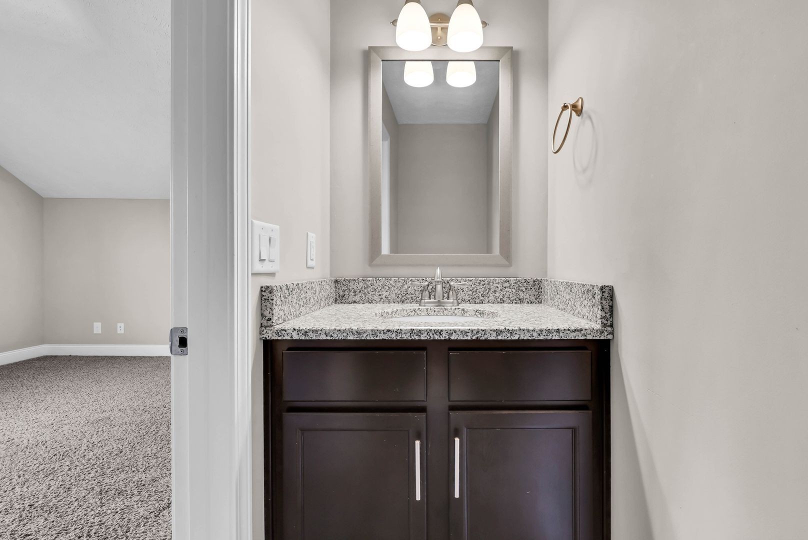 987 Promenade Drive Adams, TN 37010 - Photo 28 of 34 a bathroom with a sink and a mirror