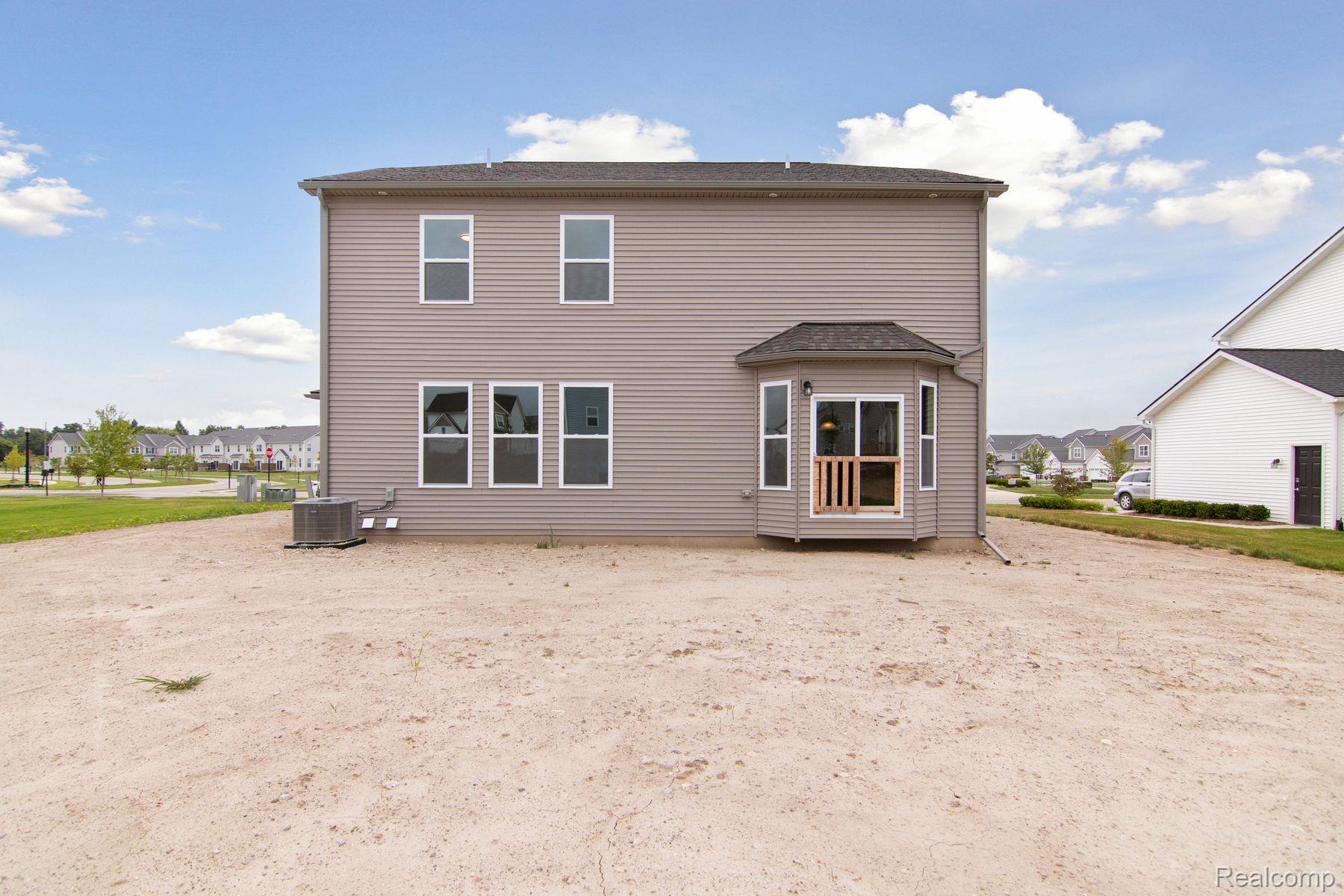 2734 Maize Loop Saline, MI 48176 - Photo 42 of 42 Back Exterior