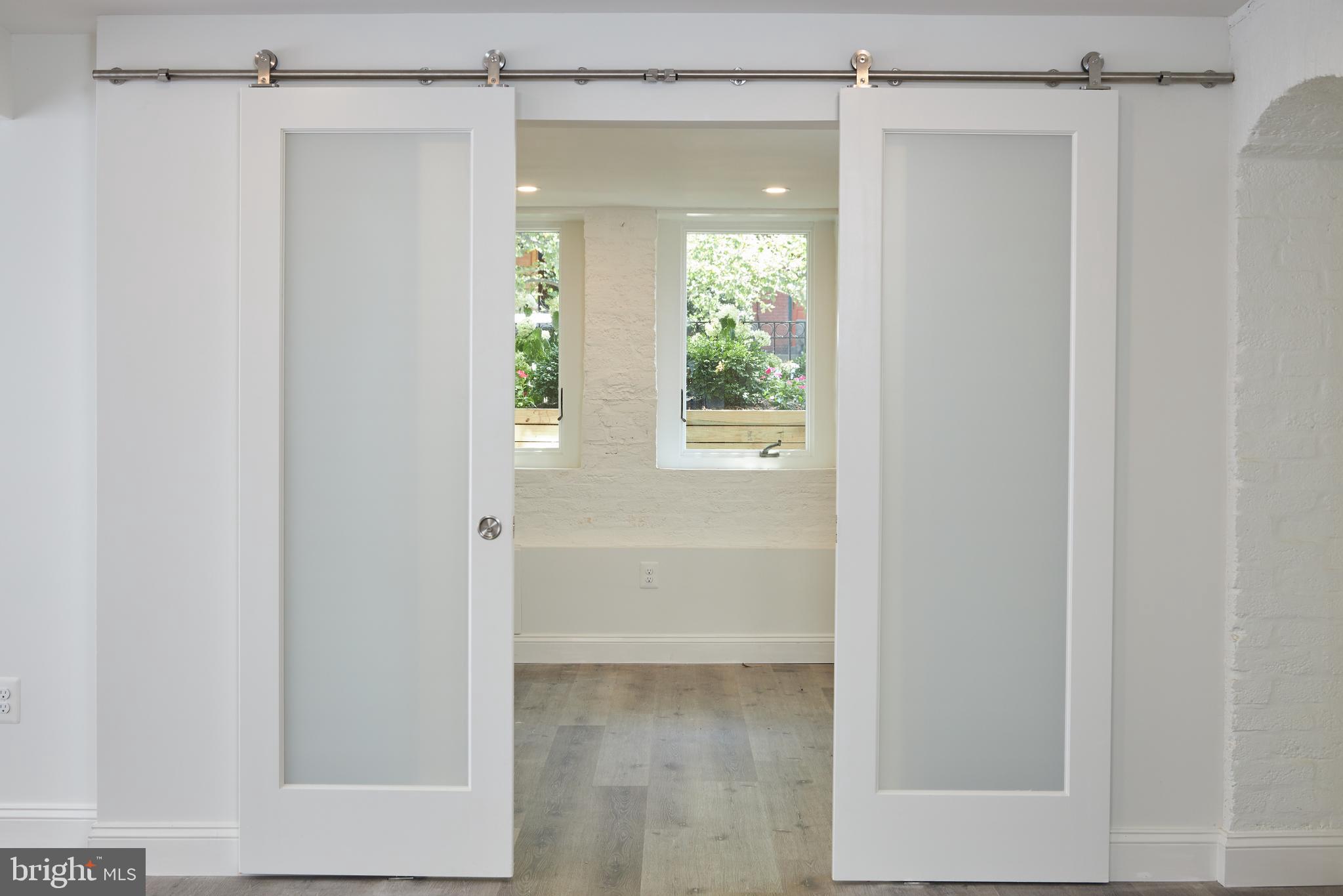 1715 Q Street Northwest, Unit B Washington, DC 20009 - Photo 24 of 41 Sliders leading to Bed 2/Den/Office