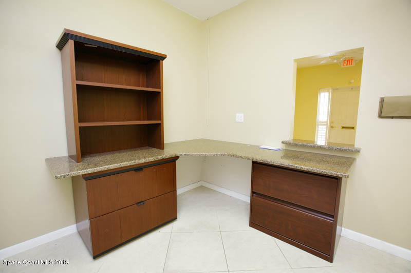 3200 North Wickham Road, Unit 4 Melbourne, FL 32935 - Photo 10 of 15 a room with storage and utility