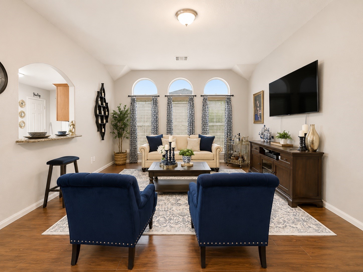 9911 Bronze Mill Lane Rosharon, TX 77583 - Photo 4 of 15 The expansive living area features soaring ceilings and abundant natural light, creating an open, airy atmosphere you'll love coming home to.