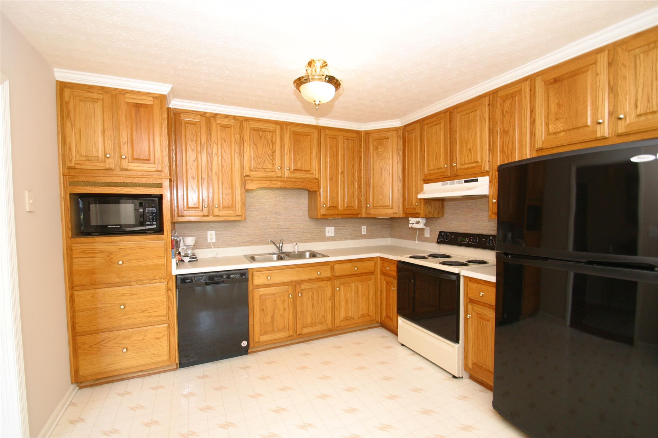 201 Putter Point Drive Gallatin, TN 37066 - Photo 5 of 24 Country Kitchen with Oak Cabinets