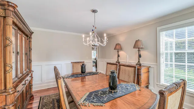 a view of a livingroom with workspace and a couch