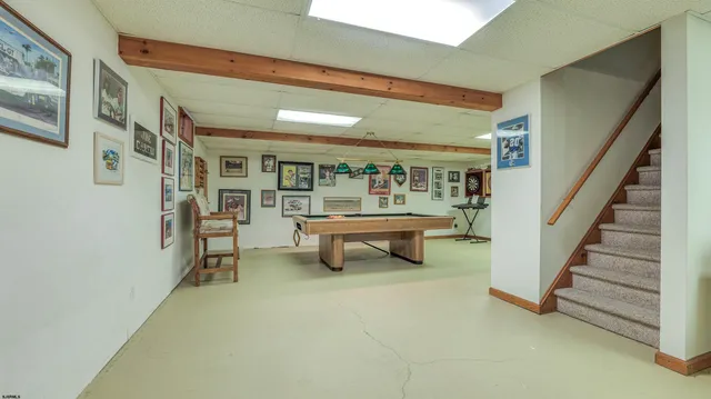 a view of a swimming pool with an outdoor seating