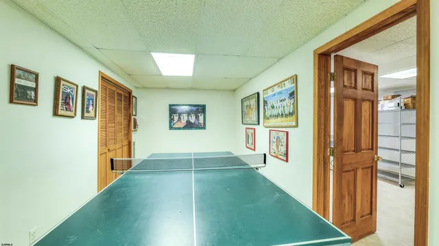 a view of a swimming pool with an outdoor seating