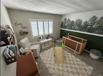 a view of living room and patio area