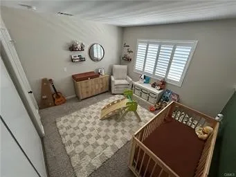 a living room with chairs