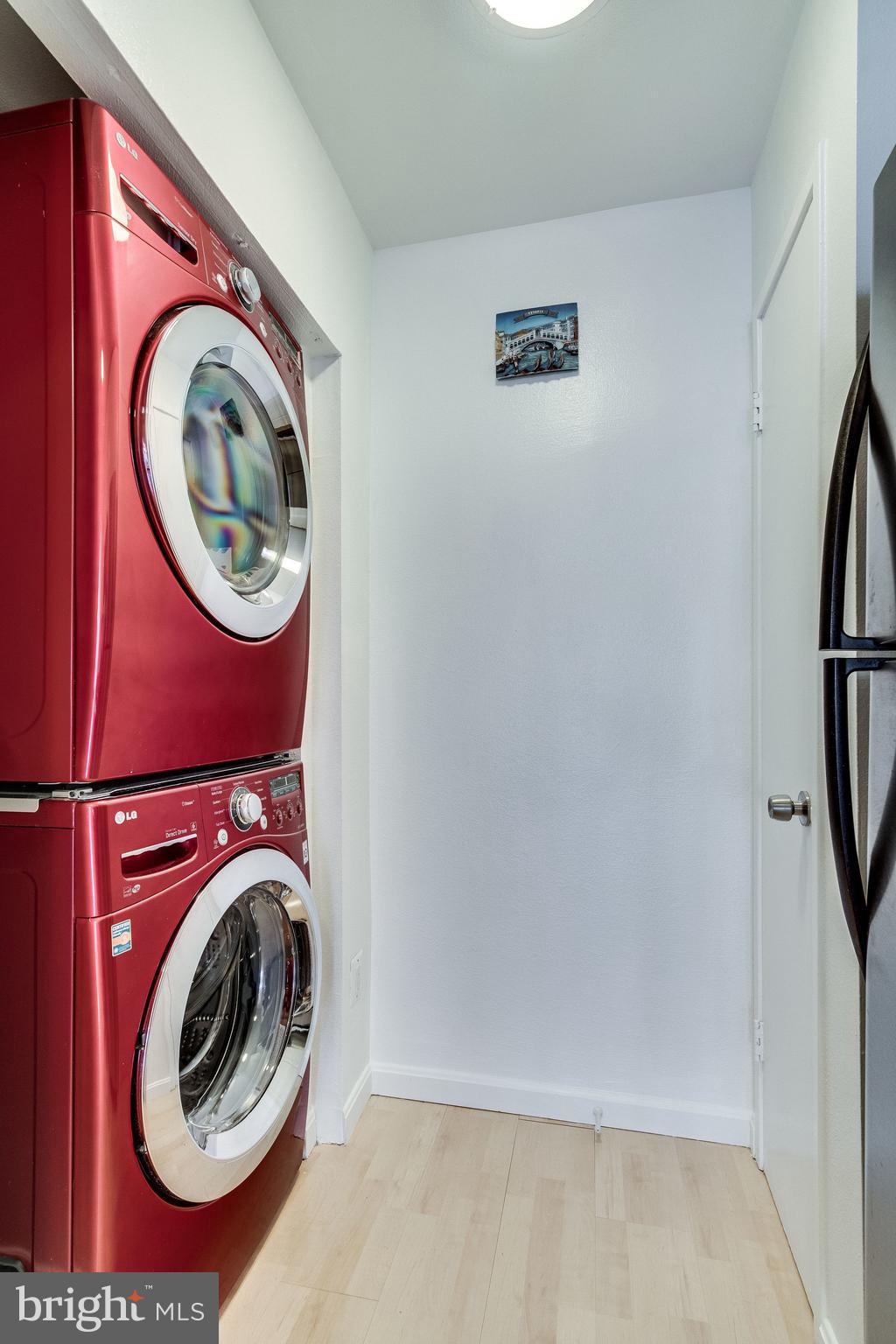 6101 Edsall Road, Unit 905 Alexandria, VA 22304 - Photo 23 of 62 a utility room with dryer and washer